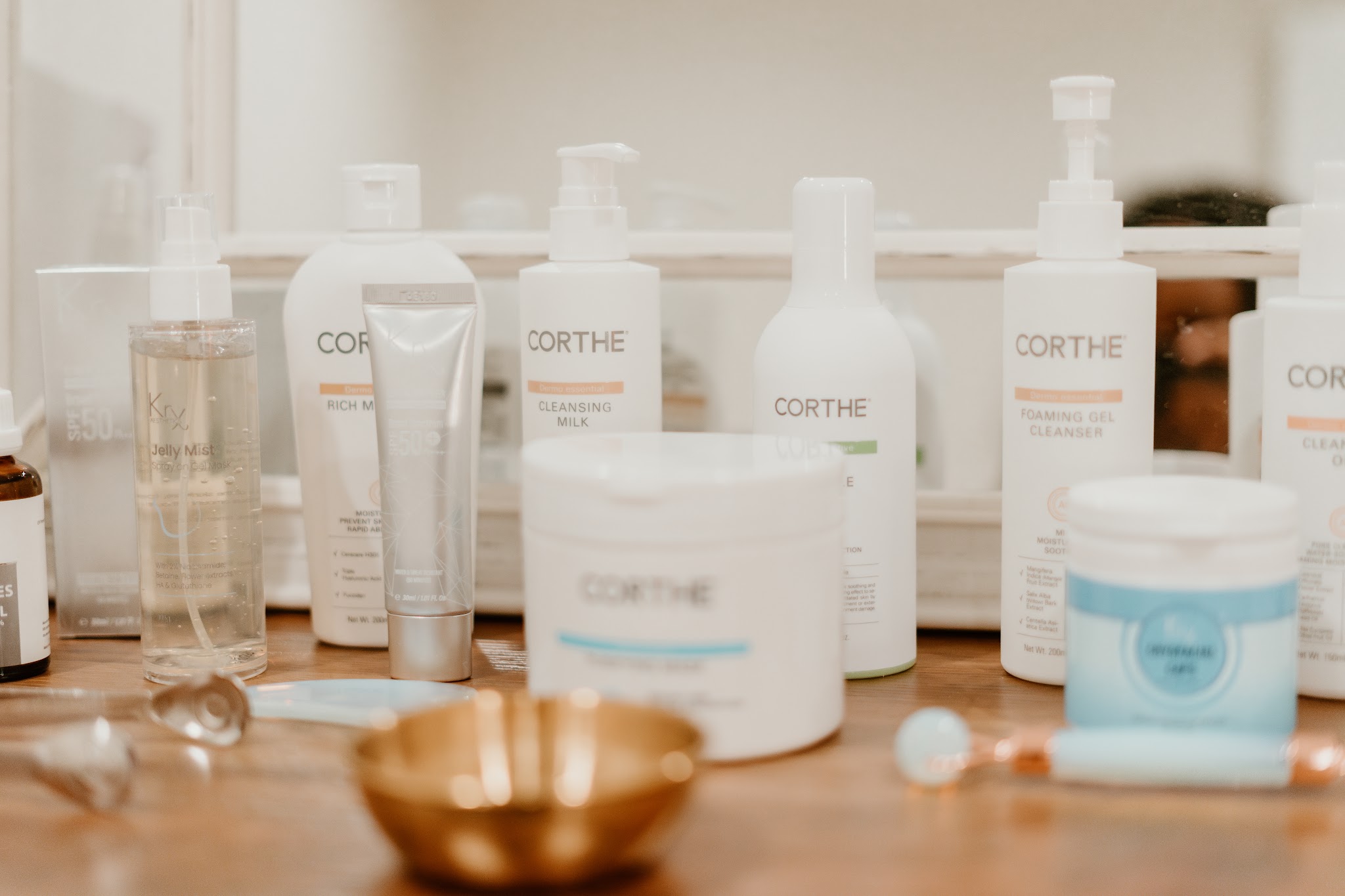 Korean skincare products, ice globes and facial tools on the counter at Grow & Glow Co