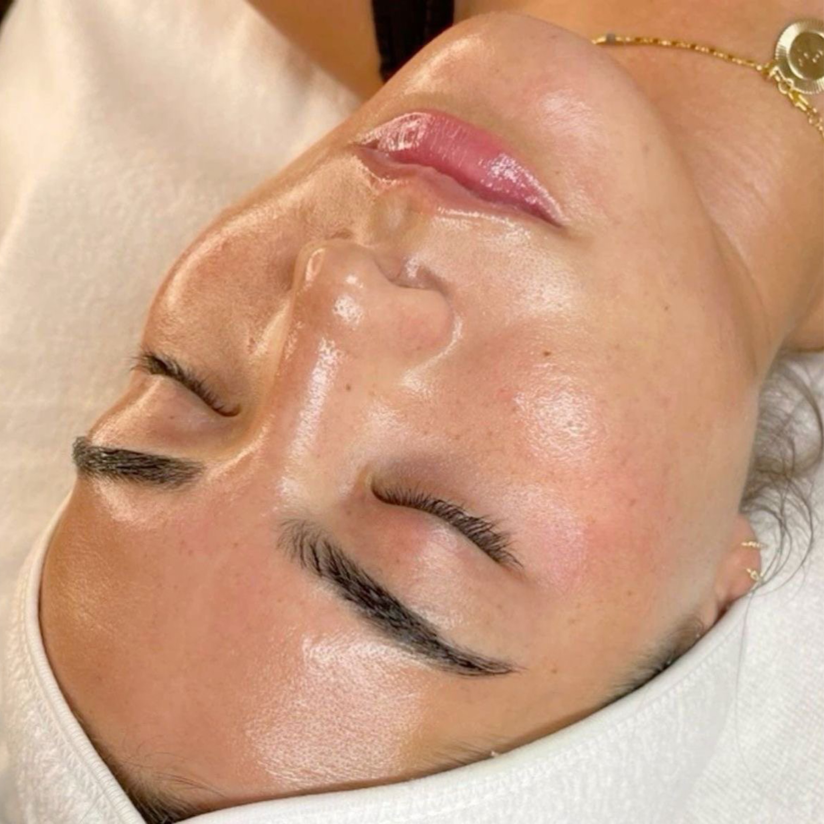 A client's glowing skin after a facial at Grow & Glow Co